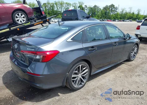 2023 Honda Civic Touring z USA, uszkodzony, nr VIN 2HGFE1F99PH321050